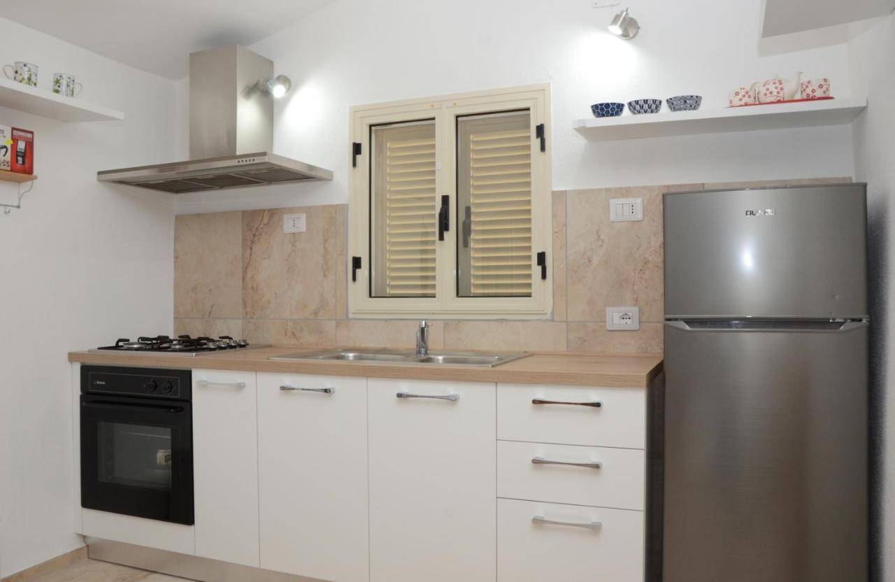 Apartments Villa Corrias Cala Liberotto Ngoại thất bức ảnh